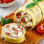 Zucchini-Rolle mit Feta und Tomaten